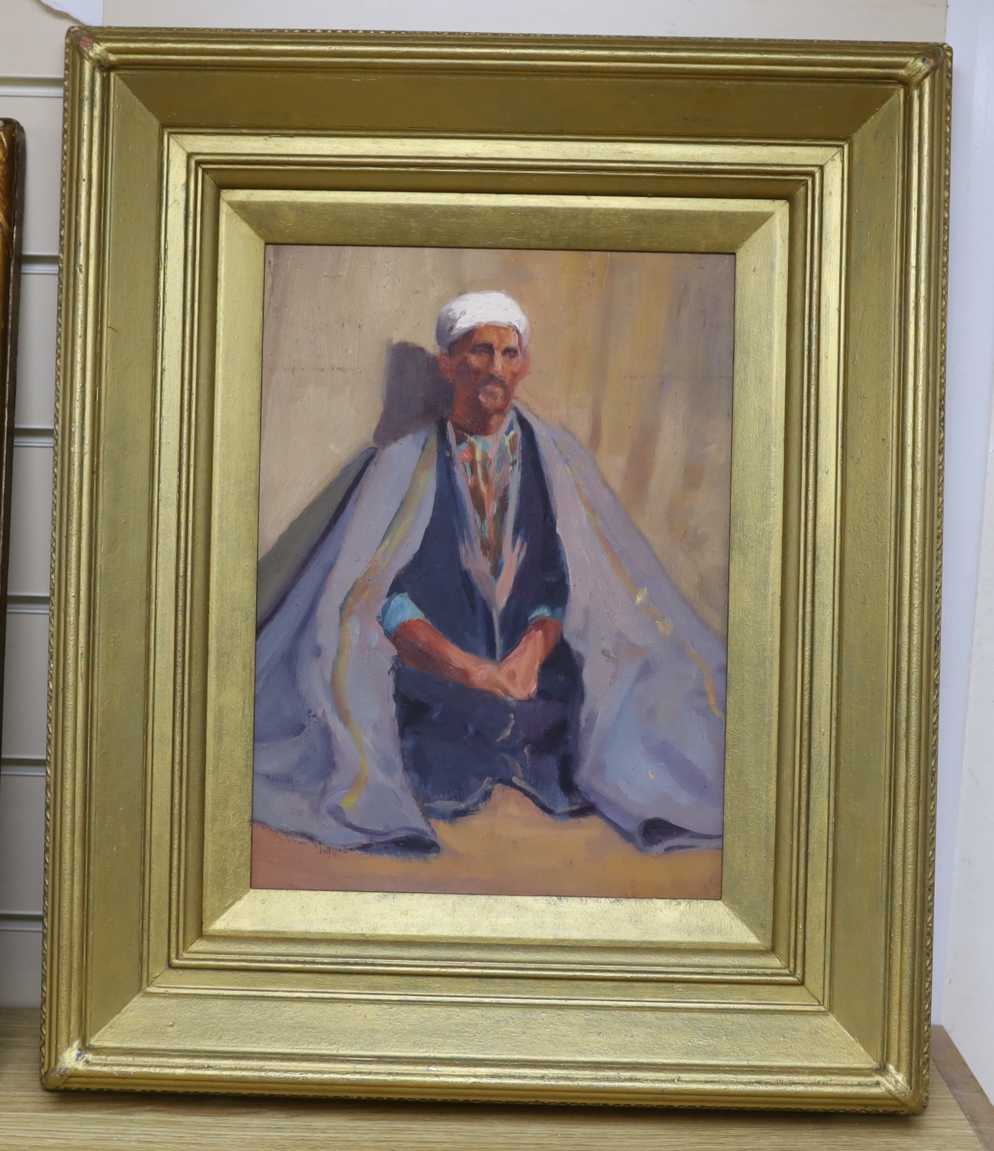 20th century Orientalist School, oil on board, Portrait of a seated Eastern gentleman in robes, unsigned, 36 x 26cm, gilt framed